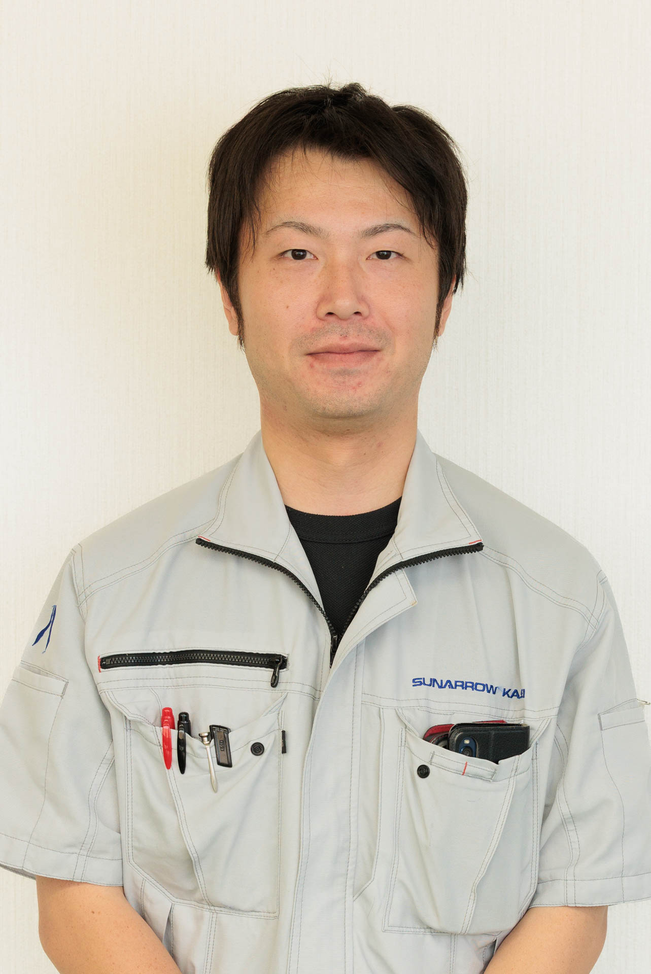 製造部 課長 出井 洋輔